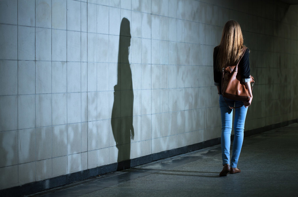 Woman Walking Alone At Night